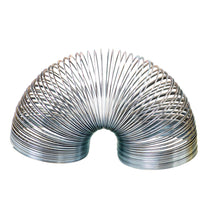 Load image into Gallery viewer, Metal slinky is splayed in an arch.
