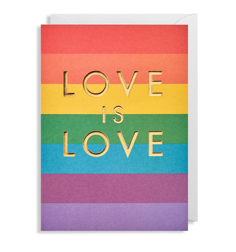 Card with 7 horizontal coloured stripes to make a rainbow. Across this,'Love is love' is written with gold foil capital letters. Inside the card is a white envelope.