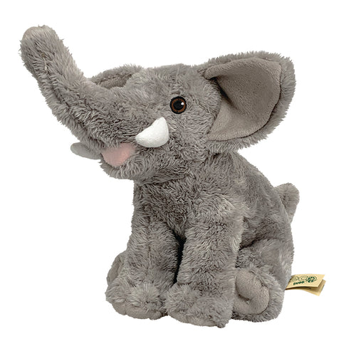 Grey elephant soft toy sits on it's back legs with it's trunk in the air. Two white tusks on either side of the trunk, and brown eyes. A small yellow tag is attached to the back leg reading 'ecobuddiez'. 
