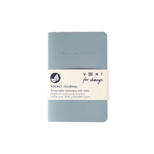 Load image into Gallery viewer, Blue notebook with white band. Notebook has engraved &quot;make a mark&quot; at the top. The yellow band reads &quot;Vent for change, pocket journal, sustainable stationery with style. Notebook made using recycled leather and 100% sustainable paper.&quot;
