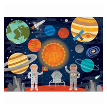 Load image into Gallery viewer, Completed puzzle image is of space with blue background, two white astronauts in the foreground and the solar system in the background.
