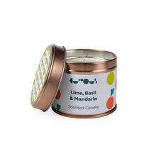 Load image into Gallery viewer, Candle in rose gold jar with white label reading &quot;lime, basil &amp; mandarin scented candle&quot; with the lid off. 
