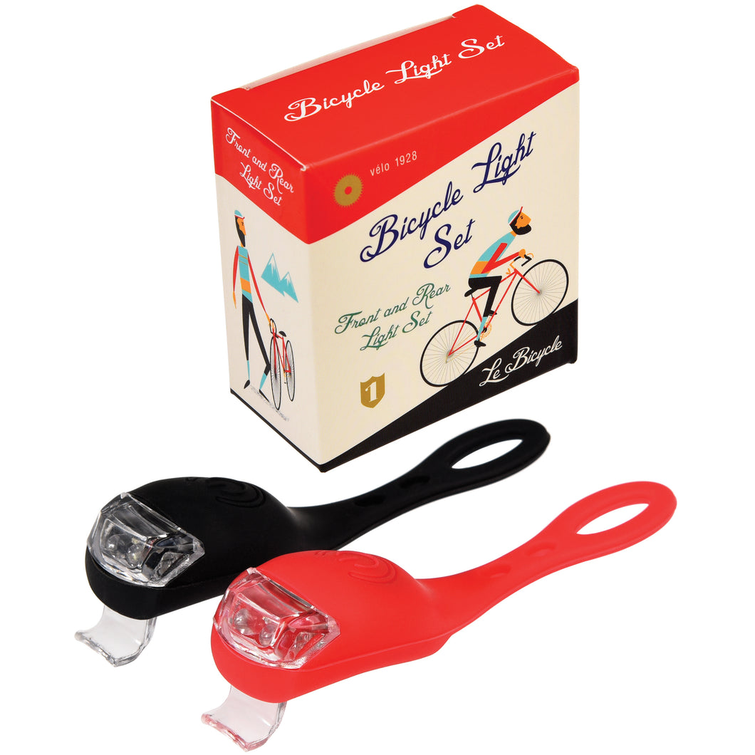 2 bike lights in front of box packaging. 