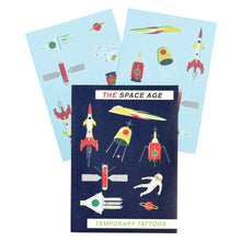 Load image into Gallery viewer, Two sheets of tattoos behind dark blue packaging. Packaging reads &#39;the space age temporary tattoos&#39; with colourful illustrations.
