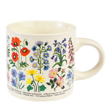 Load image into Gallery viewer, White mug with colourful illustrations of wildflowers. Handle on the right. Flowers are numbered, and across the bottom are the common and scientific names for each flower. 
