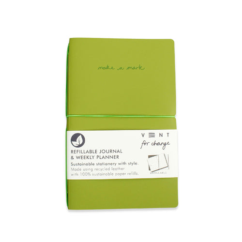 Green notebook with elastic band. Cover engraved 'make a mark'. 