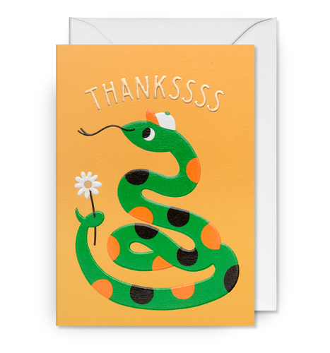 Orange card with a green snake with orange and black dots and a little cap on it's head. Snake is holding a white flower. 'Thankssss' is written above the snake. Card sits on a white envelope. 