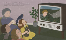 Load image into Gallery viewer, Inside spread shows a family of 4, a dog and a bird in front of a television watching David Attenborough facing a rhinoceros. Words on the page describe TV programme &#39;Wildlife on One&#39;. 
