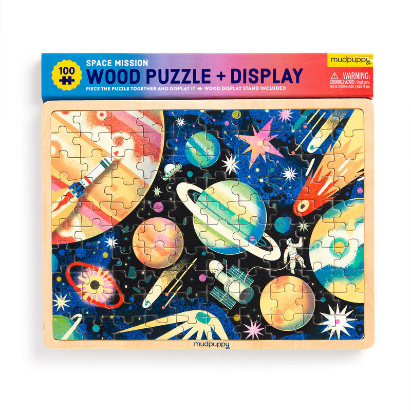 Puzzle shows illustration of planets, astronaut, satellite, stars and rockets. 