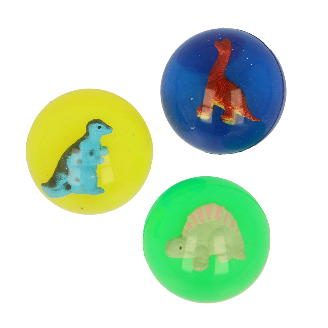 3 bouncy balls in three different colours. The yellow ball has a blue plastic dinosaur with short arms inside. The blue ball has a red plastic dinosaur with a long neck inside. The green ball has a green stegosaurus inside. 
