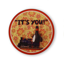 Load image into Gallery viewer, Orange and red coaster with Feathers McGraw riding a train. Words across the top read &quot;it&#39;s you&quot;
