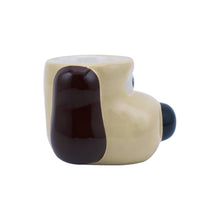 Load image into Gallery viewer, Side of egg cup shows 3D facial features. 
