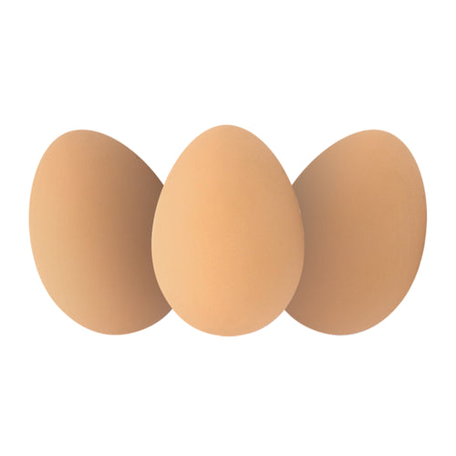 Three pale beige eggs overlap. 