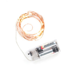 Load image into Gallery viewer, Copper lights wound up with the plastic covered wire connecting to a battery pack. Inside are two batteries. Battery pack has on and off switch and slide to open. 
