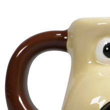 Load image into Gallery viewer, Close-up of a beige mug with a brown handle on a white background
