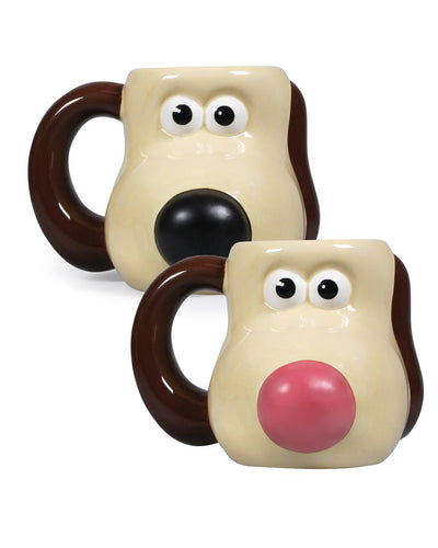 two gromit mugs, one with a black nose, one with a red nose. 