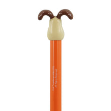 Load image into Gallery viewer, Close up of back of dog head at top of pen. Aardman rights listed on orange pen. 

