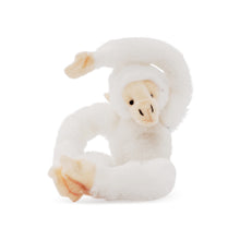 Load image into Gallery viewer, a white monkey plush with its arm above its head 
