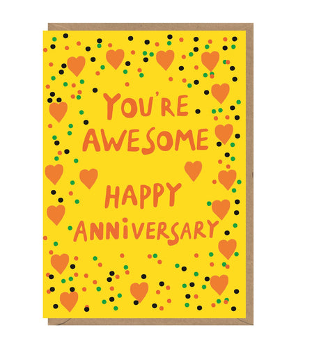 Yellow card with orange hearts and multicolour dots. Card reads 'you're awesome, happy anniversary' in orange font.