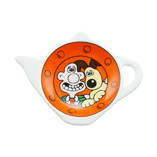 Tea bag holder with cartoon characters on an orange background
