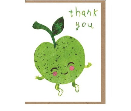 White card with illustration of a smiling, jumping green apple. Top right reads 'thank you' in green letters. Envelope is brown craft paper. 