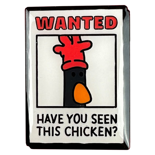 Pin badge shows wanted poster with picture of penguin with red glove on head and words 'wanted have you seen this chicken?'