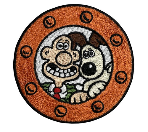 Wallace and Gromit peer out of a porthole on this round patch. 