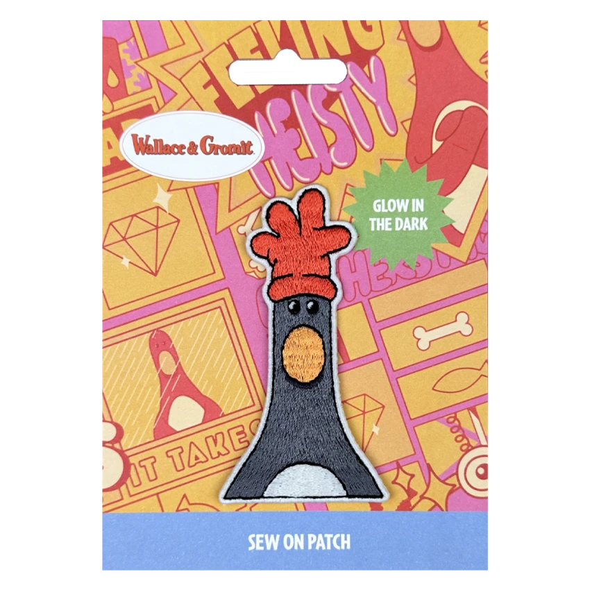 Patch of the top of Feathers McGraw body on a cardboard backing. 