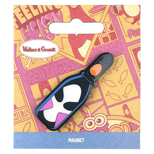 Magnet of a penguin squished into a milk bottle. 