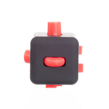 Load image into Gallery viewer, Black fidget cube with red half circle to roll. 
