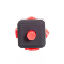 Load image into Gallery viewer, Black fidget cube with a button to push. 
