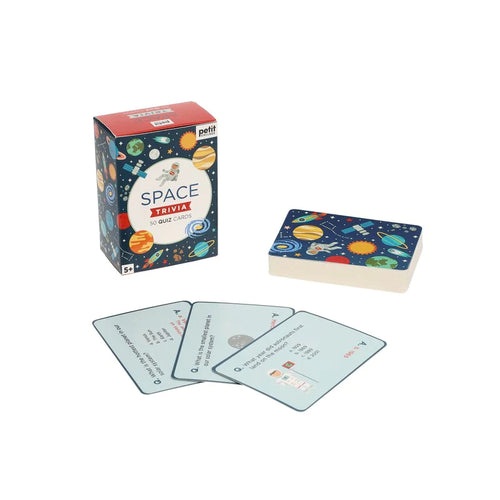 Card pack is blue and red with small illustrations of space themed objects. Pile of cards show that the back of cards show same illustations. 3 cards are fanned out face up in front of the stack of cards and pack. They each show a question and multiple choice answers, with the Answer shown upside down. 