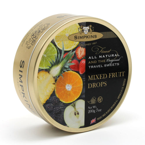 Gold coloured metal tin with photo of pineapple, lime, lemon, orange, apple and strawberry sliced open. Packaging reads 'Simpkins, established 1921, finest all natural and the original travel sweets.'