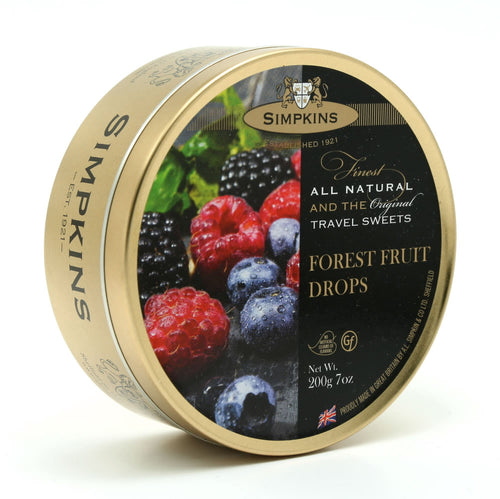 Gold coloured metal tin with photo of raspberries, blueberries and blackberries. Packaging reads 'Simpkins, established 1921, finest all natural and the original travel sweets.'