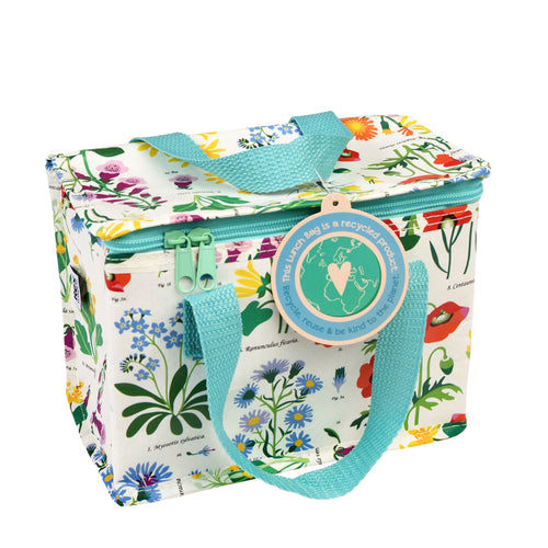 White lunch bag with illustrations of wild flowers. Handle and zipper are light blue. Card swing tag is attached with plastic tag. 
