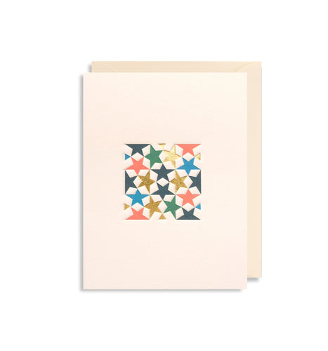 Cream card with multi-coloured stars in a square in the middle. Cream envelope is tucked inside.