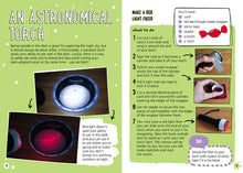 Load image into Gallery viewer, Inside spread reads &#39;an astronomical torch&#39;. Left page is green with paragraph of text and two photos of a round circle lit up in white and red light. On the right are instructions to &#39;make a red light filter&#39; with 7 instructions, a text box of &#39;what you&#39;ll need&#39; and a tip box. There are three photographs to help with the instructions, two of which have a white hand. The final photo is the completed filter, which looks like a torch with a red cover.
