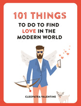 Load image into Gallery viewer, Book cover is white with red border. Title reads &#39;101 Things to do to find love in the modern world&#39;. Illustration of a light-skinned male angel wearing a suit, holding a bow and arrow in one hand a a phone in the other, and a little dog are underneath the title. Author name across the bottom reads &#39;Cleopatra Valentine&#39;. 
