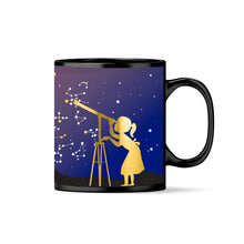 Load image into Gallery viewer, Black mug with handle facing to the right. Mug colour changing from black to blue, white lines connecting stars to make constellations.
