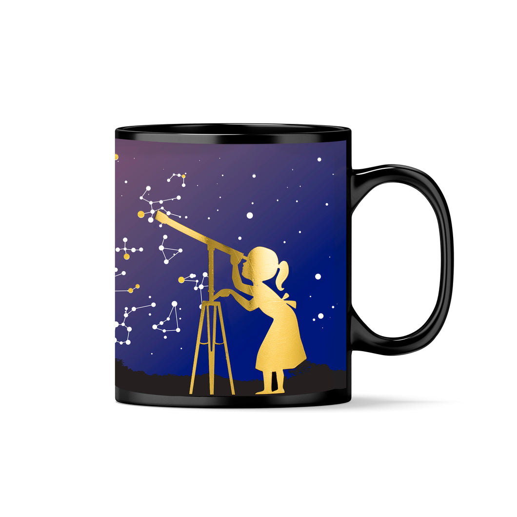 Black mug with handle facing to the right. Mug colour changing from black to blue, white lines connecting stars to make constellations.