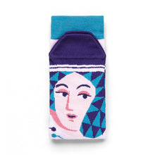 Load image into Gallery viewer, Socks folded over. Feet of the sock shoe a white face with blue hair shaped with triangles and a purple toe section. Trim on top of the sock is a bright blue. 
