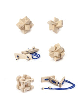 Load image into Gallery viewer, 6 different light-coloured wooden puzzles, two with blue string. 
