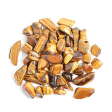Load image into Gallery viewer, Pile of gold tiger eye are gold coloured with brown stripes. 
