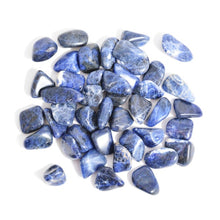 Load image into Gallery viewer, Pile of dark blue Sodalite gemstones with white lines. 
