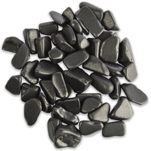 Load image into Gallery viewer, Pile of matte black shungite gemstones.

