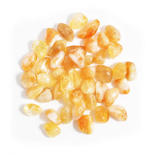 Load image into Gallery viewer, Pile of translucent yellow-orange citrine gemstones. 
