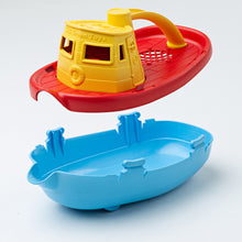 Load image into Gallery viewer, Tugboat top raised from the blue base.
