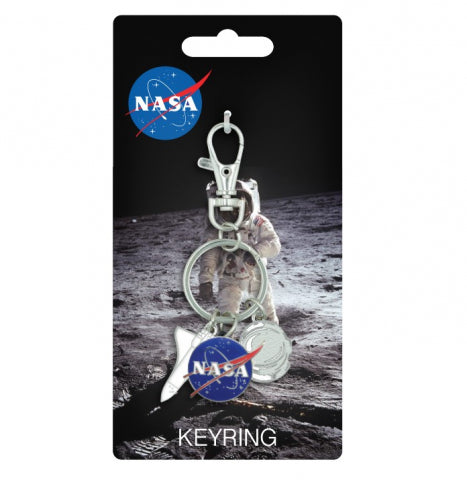 Keyring is attached to card with plastic loop. Keyring attachment has a lever and opens a small loop. Charms are astronaut helmet, blue NASA logo and white shuttle. Card shows image of an astronaut on the moon with 'keyring' written below. NASA logo is in top left.