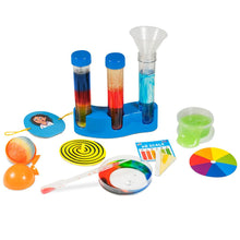 Load image into Gallery viewer, Contents of the kit pictured: bouncy ball in plastic shell, card, spinning top, petri dish and pipette, pot of green goo, paper colour wheel, 3 test tubes on a blue rack, with a funnel in one. 
