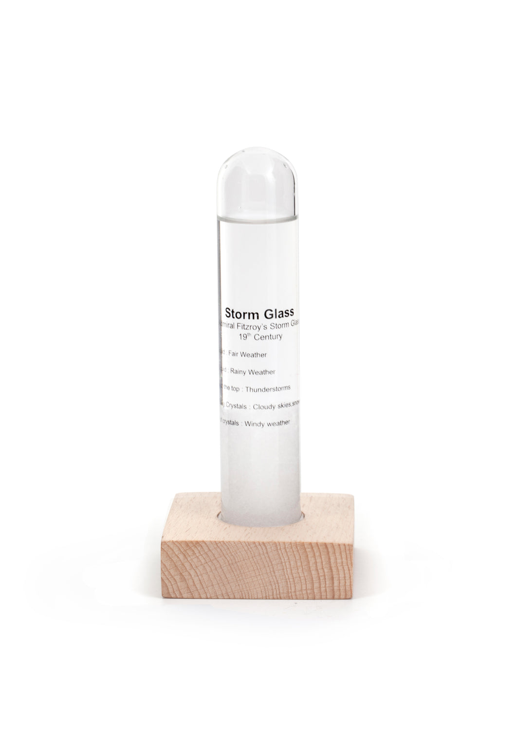 Storm glass is a tube resting inside a square wooden block. Storm glass has details listed on the outside to assist with understanding contents. 